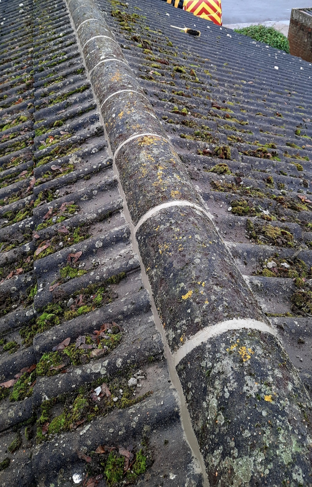 Ridge tiles re-bedded — Northiam