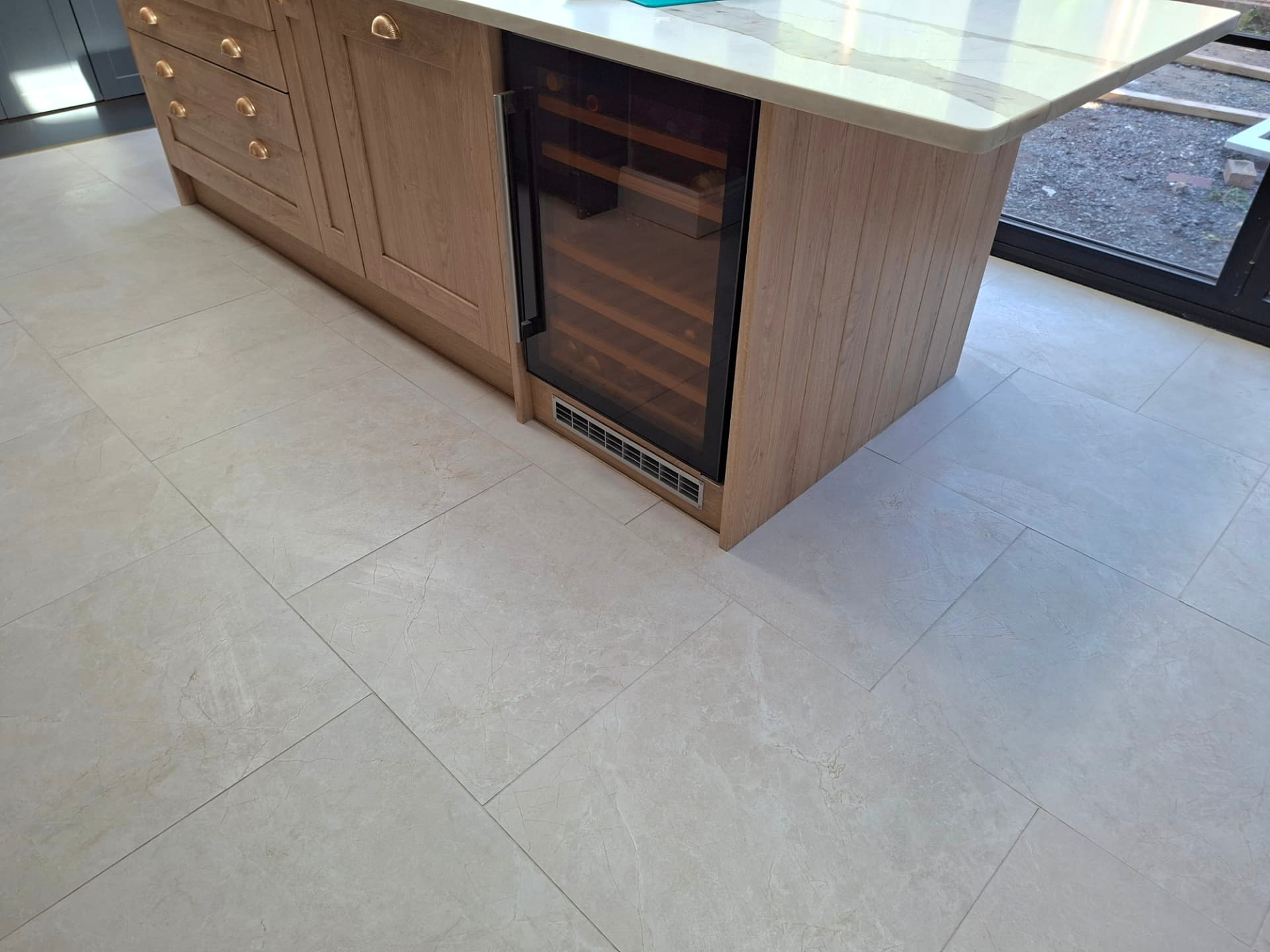 Kitchen floor tiling — Battle