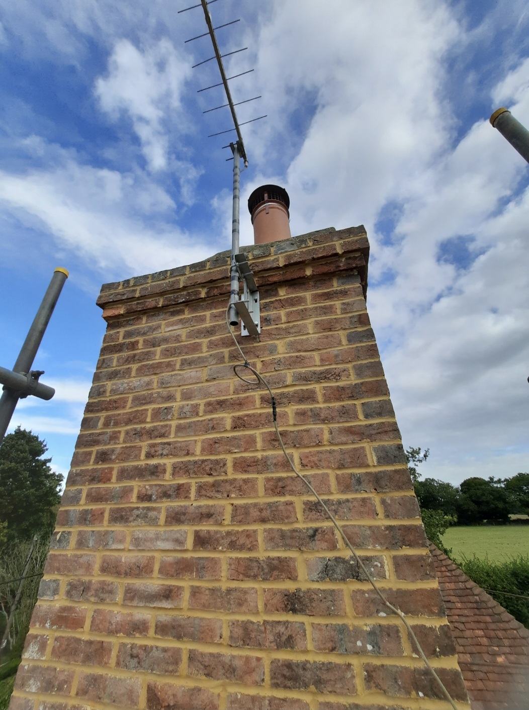 Chimney repointing in heritage lime — Northiam