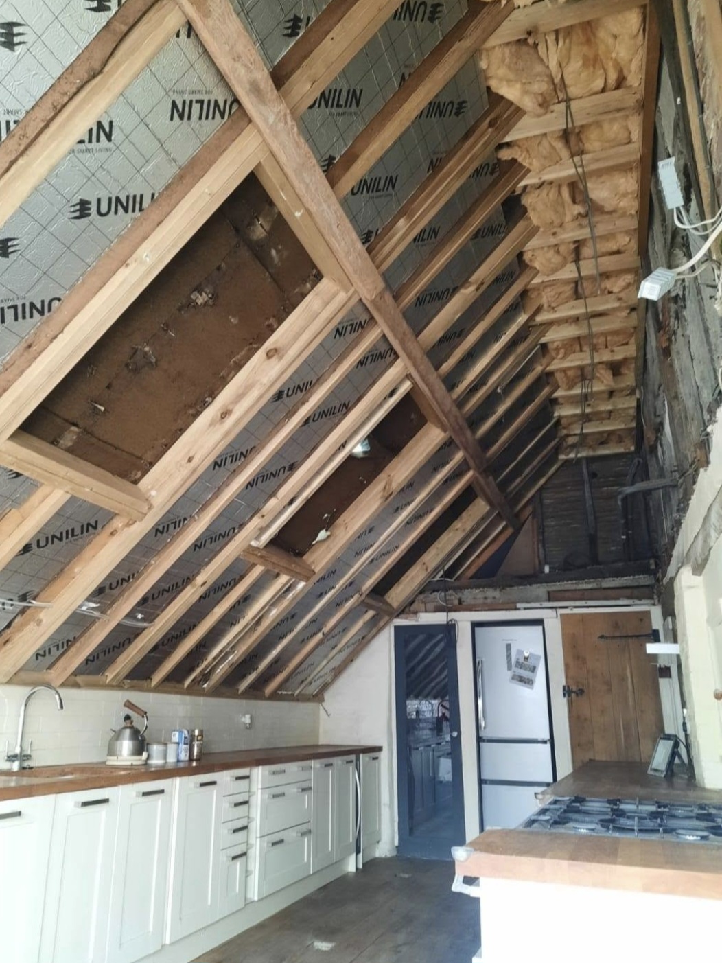 Rafter insulation & new trimmers for Velux windows