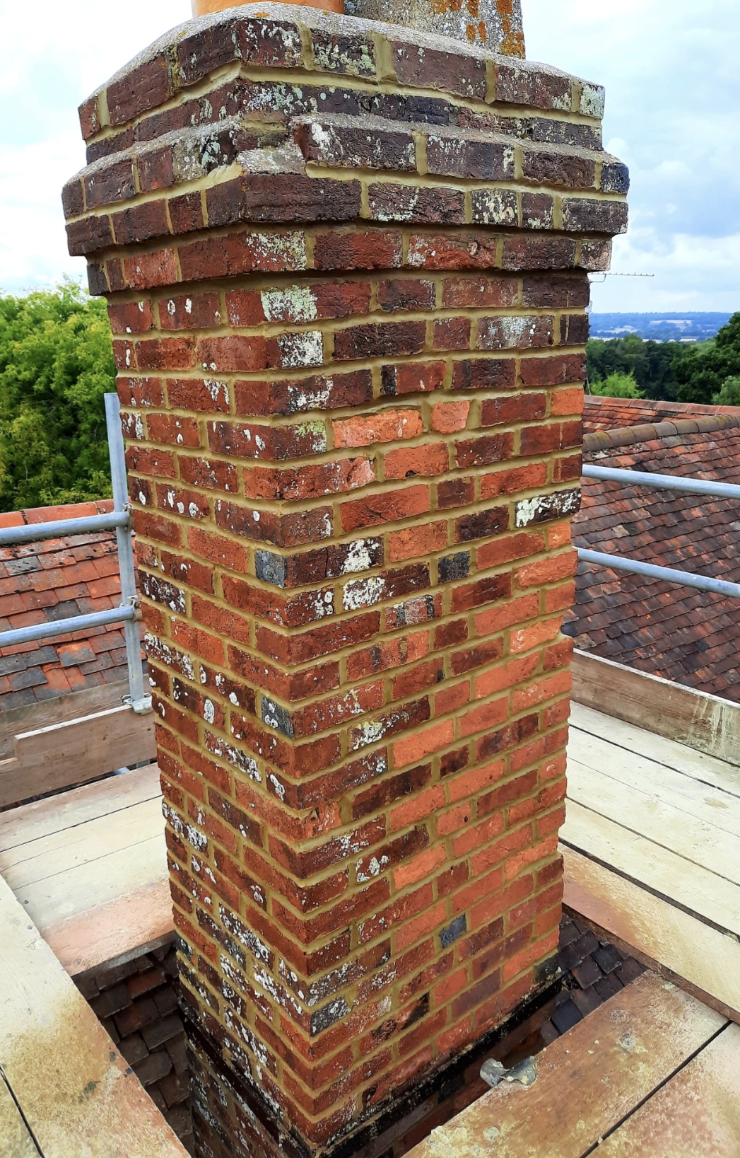 Chimney repointing in heritage lime — Northiam