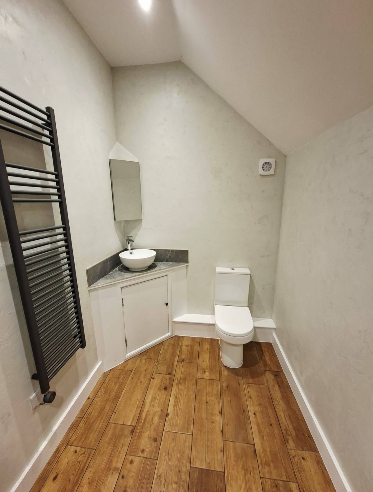 Loft cloakroom with polished plaster